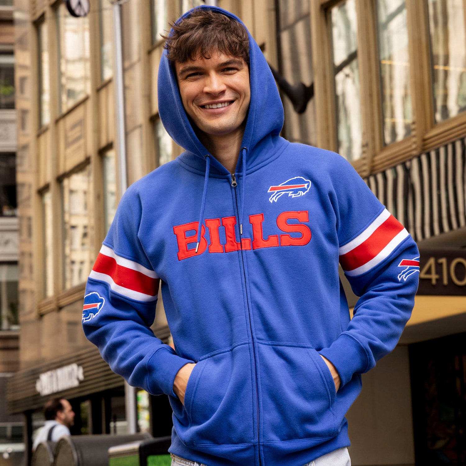 Buffalo Bills Icer Brands Jetfire Wordmark Sweatshirt In Blue - Front View On Model With Hood Up