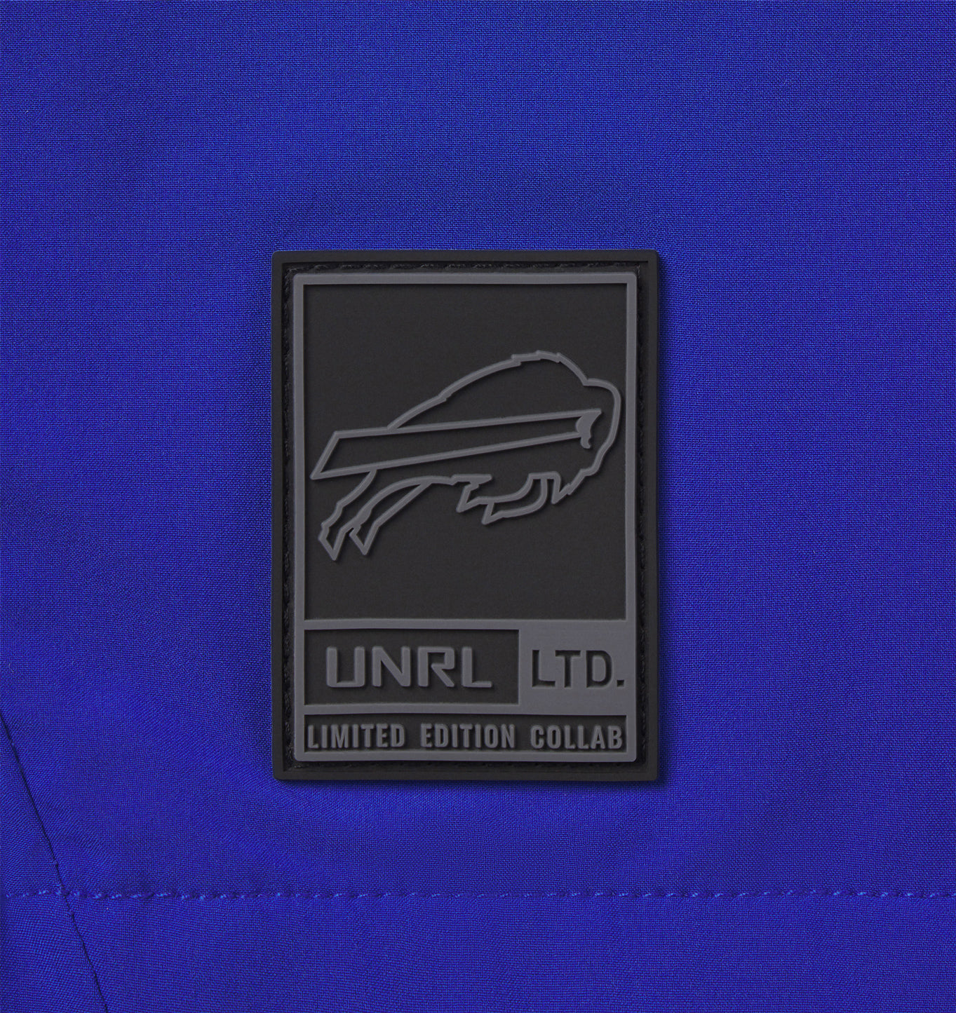 UNRL x Bills '24 Track Jacket In Blue - UNRL Emblem View