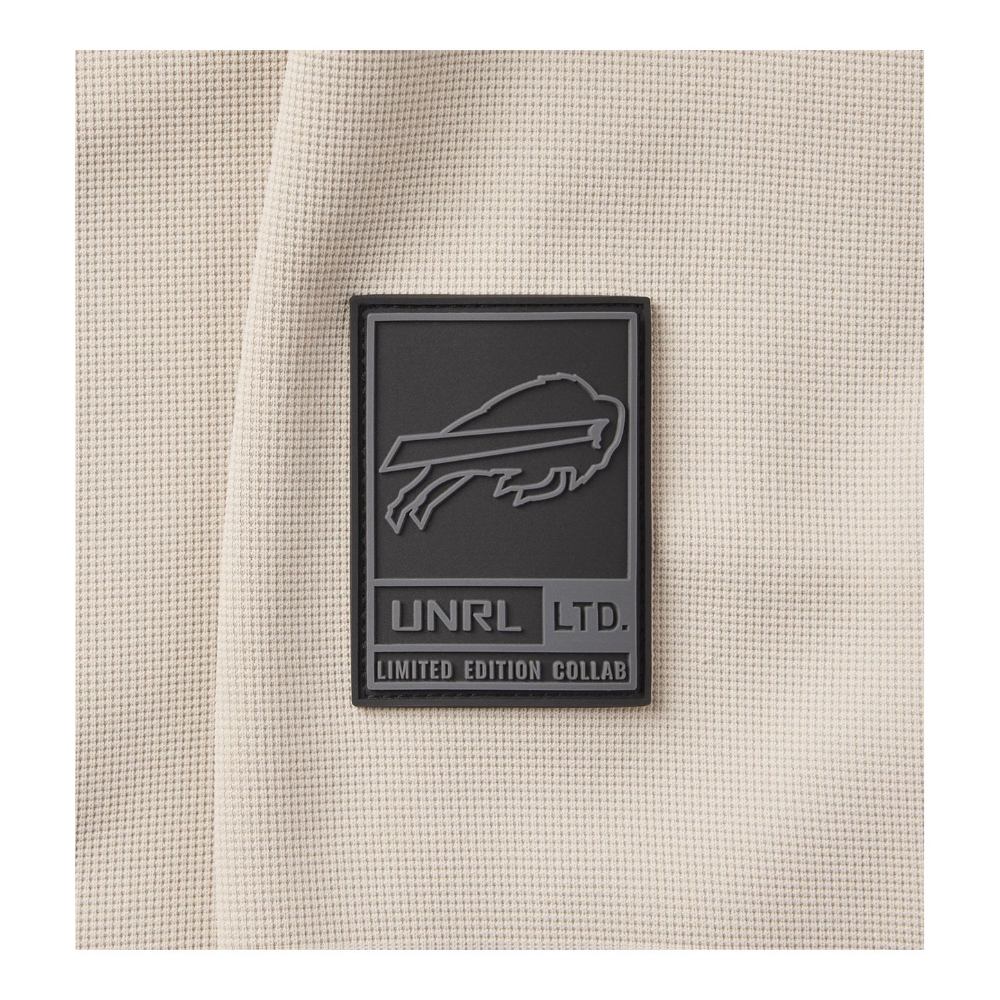 UNRL x Bills Impact Full-Zip In Tan - Zoom View On Left Shoulder Tag