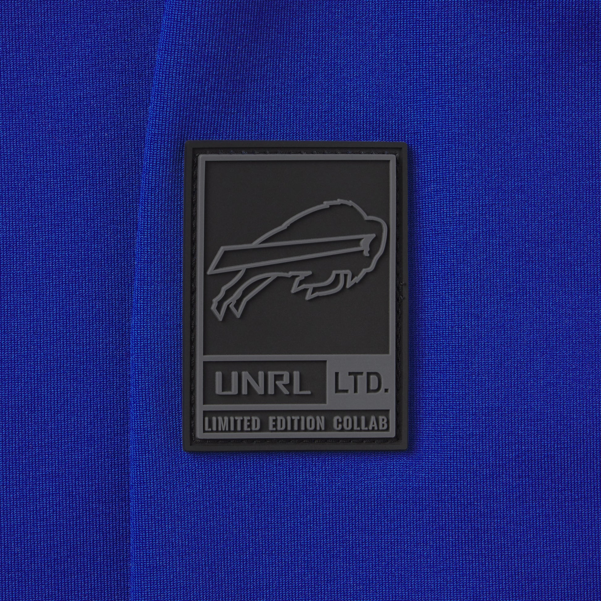 UNRL x Bills Crossover Hoodie II In Blue - Zoom View On Left Sleeve Graphic